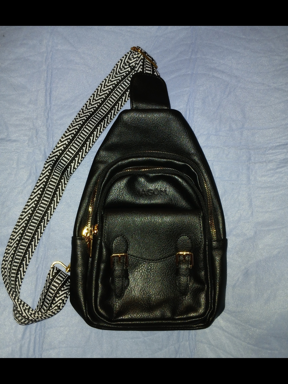 Sling Backpack with Patterned Strap